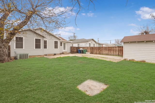 view of yard with a patio area and central AC unit