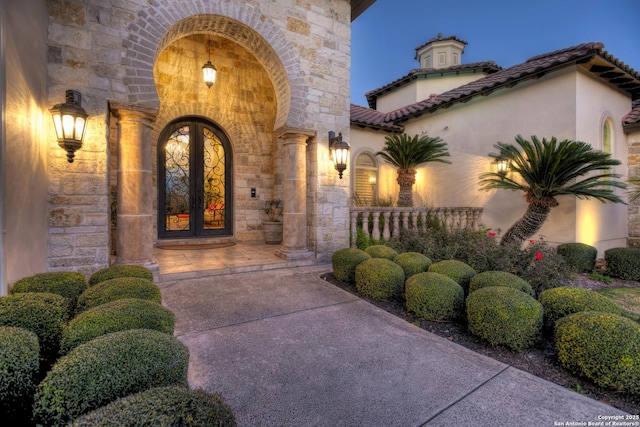 view of exterior entry with french doors