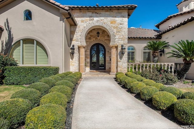 doorway to property featuring french doors