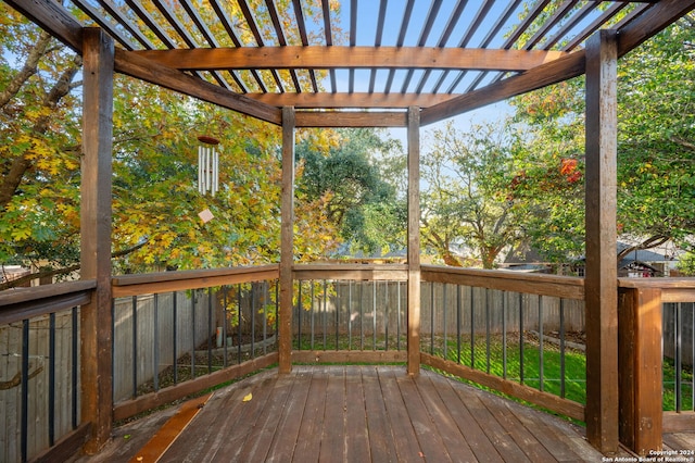 wooden deck featuring a pergola