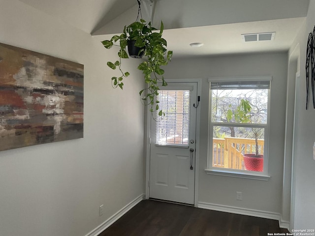 doorway featuring dark hardwood / wood-style floors