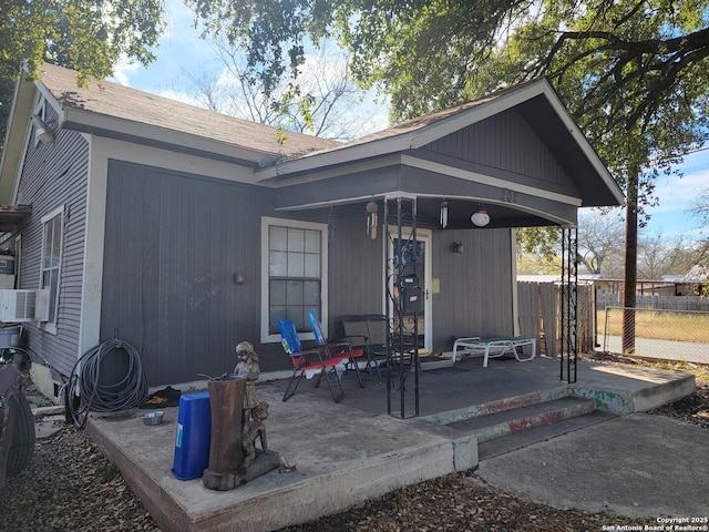 back of house featuring a patio and cooling unit