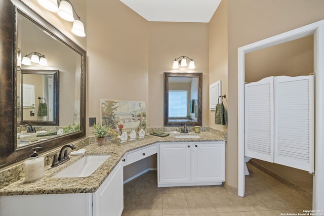 bathroom featuring vanity and tile patterned flooring