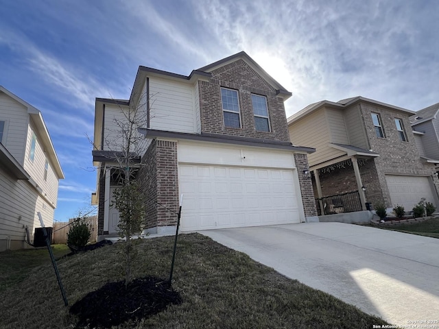 view of property with a garage and central AC unit