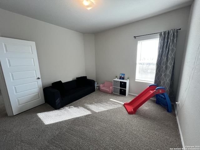 rec room featuring carpet flooring