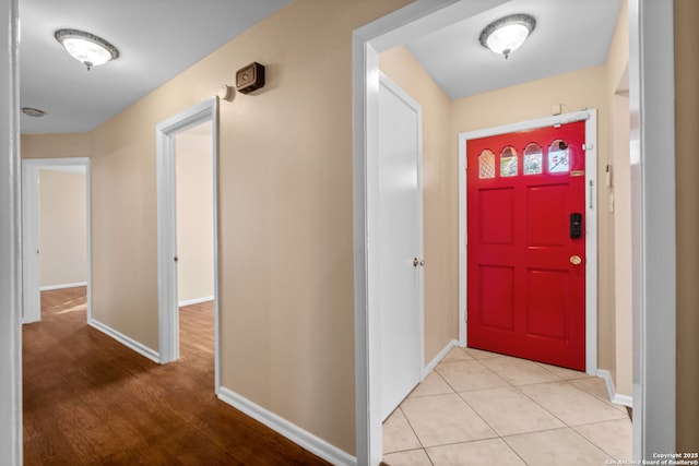 entryway featuring light tile patterned floors