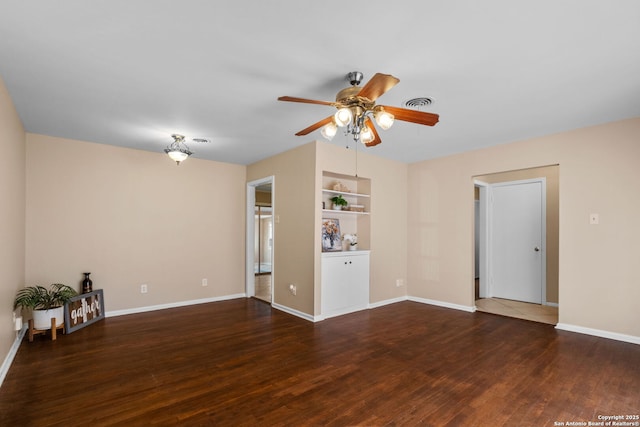 unfurnished living room with ceiling fan, built in features, and dark hardwood / wood-style floors