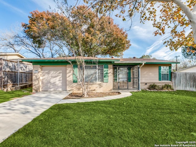 single story home with a front yard and a garage