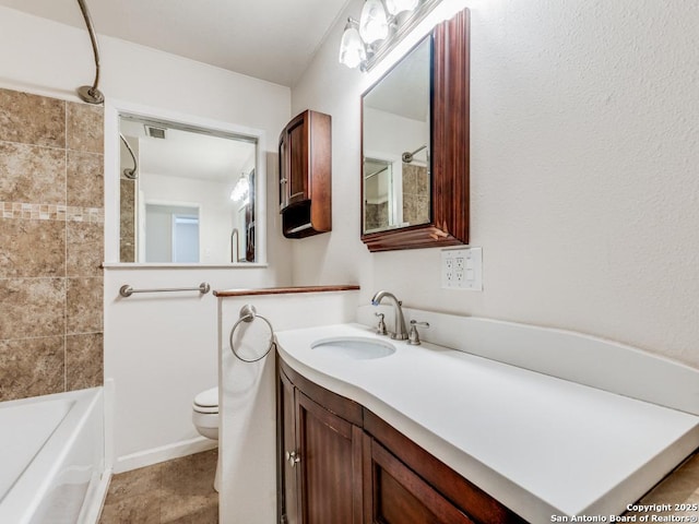 full bathroom with toilet, vanity, and bathing tub / shower combination