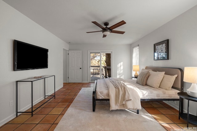 tiled bedroom featuring access to exterior and ceiling fan