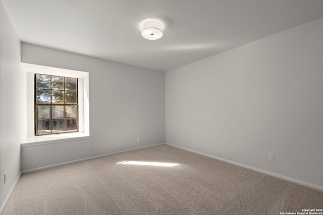 empty room featuring carpet floors