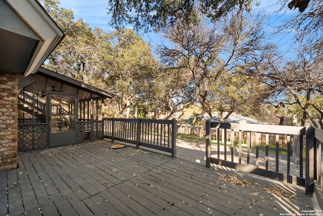 deck with a sunroom