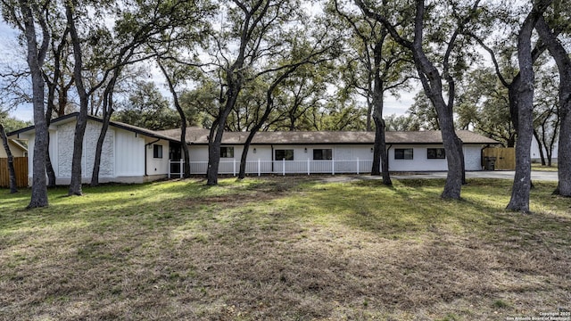 view of front of home with a front yard