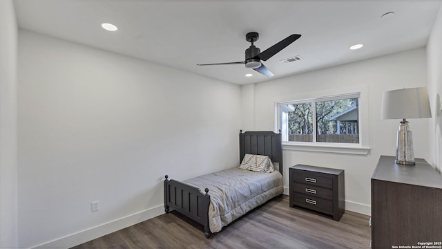 bedroom featuring wood-type flooring and ceiling fan