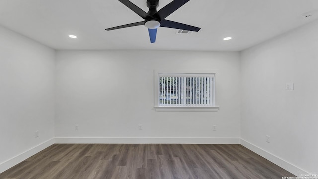 unfurnished room featuring hardwood / wood-style flooring and ceiling fan