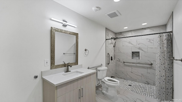 bathroom featuring toilet, vanity, and a shower with curtain