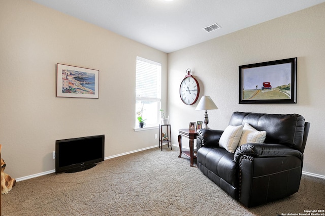 living room featuring dark colored carpet