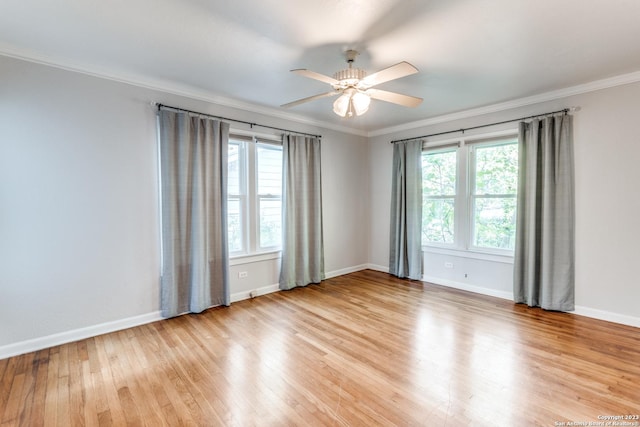 unfurnished room with ornamental molding, ceiling fan, and light hardwood / wood-style floors