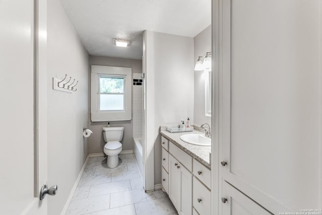 full bathroom featuring toilet, vanity, and tub / shower combination