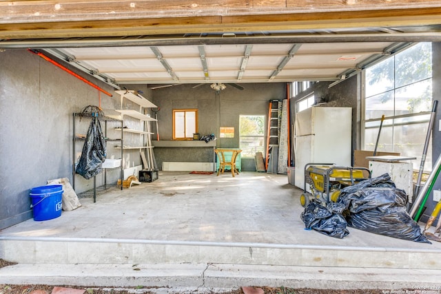 garage with white fridge