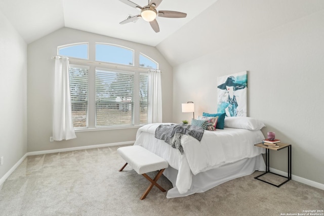 carpeted bedroom with lofted ceiling and ceiling fan