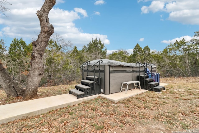 view of outdoor structure with a jacuzzi