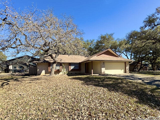 single story home with a garage