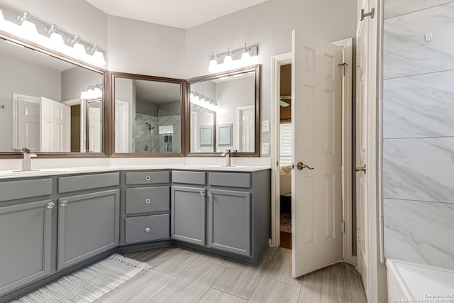 bathroom with vanity and walk in shower