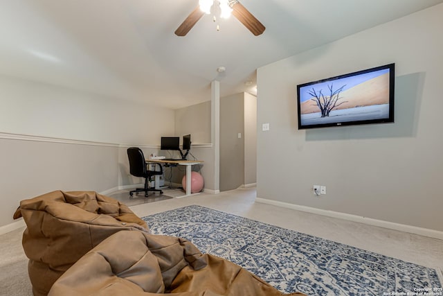 carpeted office with ceiling fan