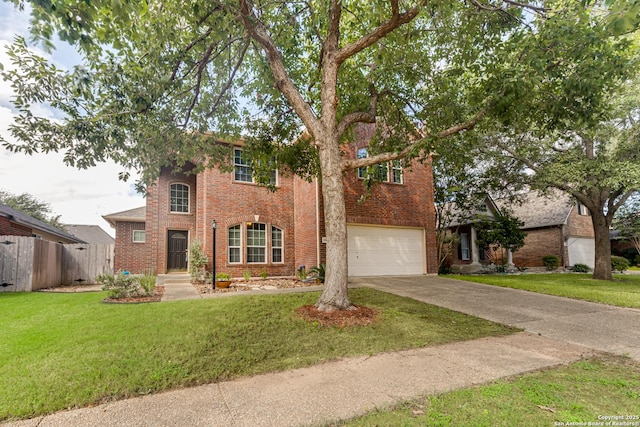 view of front of home featuring a front yard and a garage