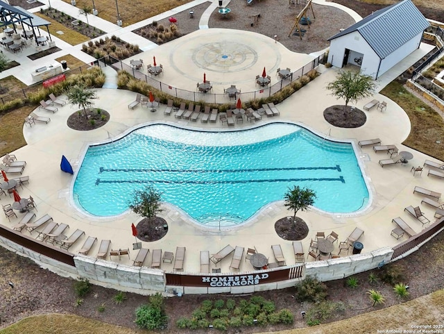 view of pool featuring a patio area