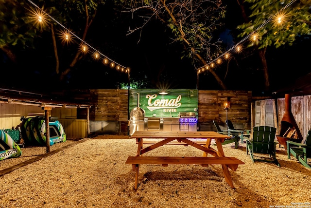 view of patio at night