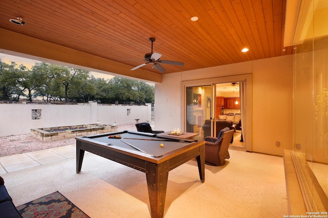 exterior space featuring ceiling fan