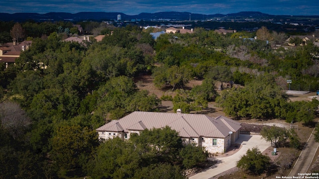 drone / aerial view featuring a mountain view