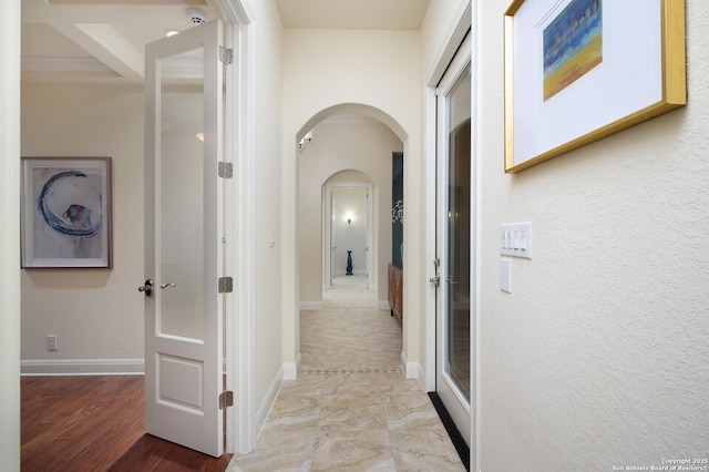 corridor with light wood-type flooring