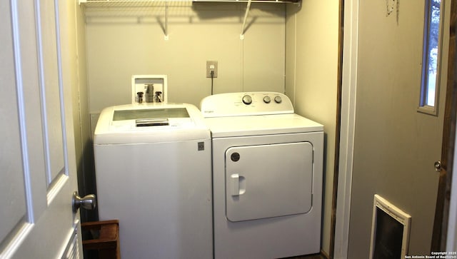 laundry room with independent washer and dryer