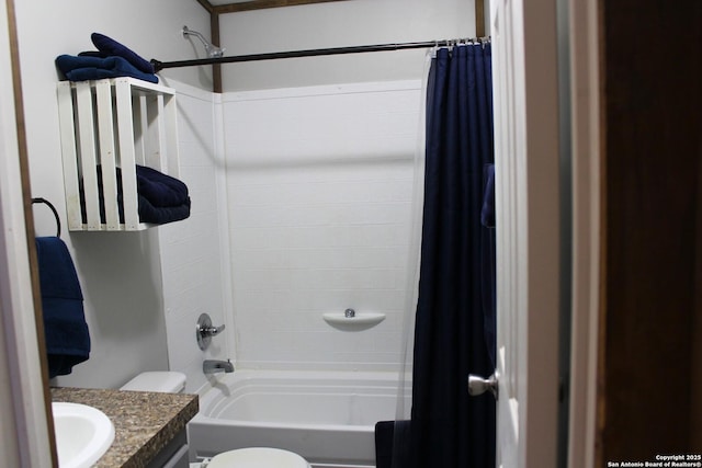 full bathroom with toilet, shower / bath combo, and vanity