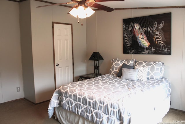 bedroom with lofted ceiling, ceiling fan, and carpet