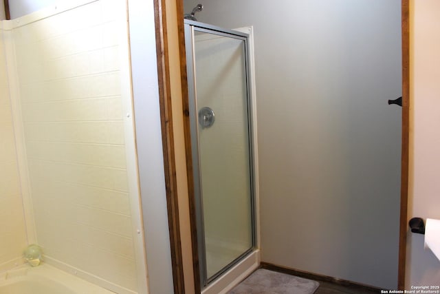 bathroom featuring walk in shower