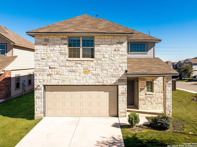 view of front property with a front yard and a garage