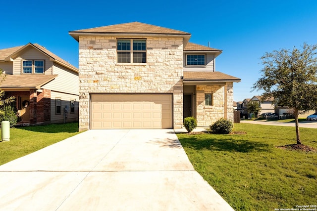 view of front of house featuring a front yard and a garage