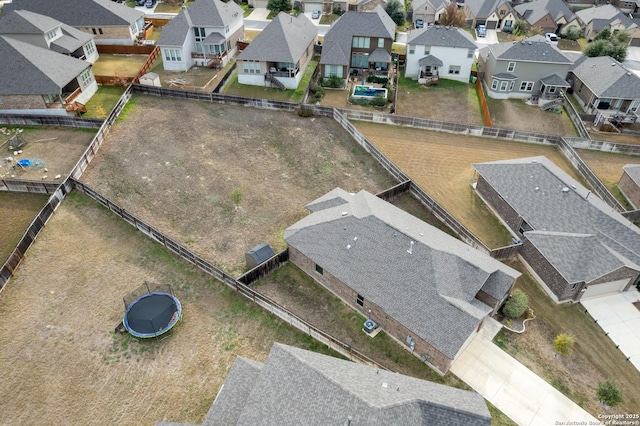 birds eye view of property with a residential view