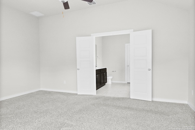 empty room with ceiling fan, visible vents, baseboards, and light colored carpet