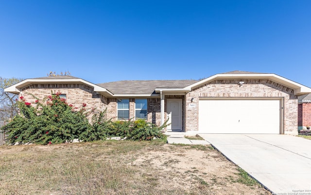 ranch-style home featuring a garage