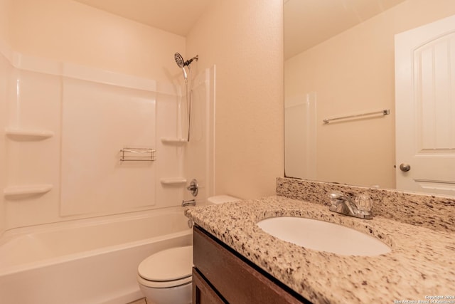 full bathroom featuring toilet, bathtub / shower combination, and vanity