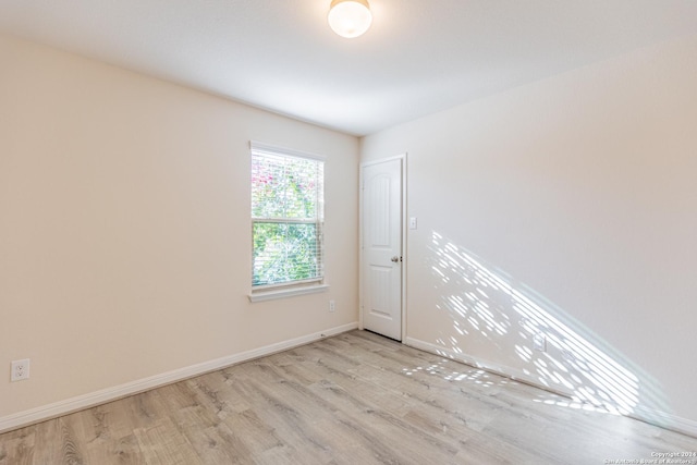 empty room featuring light hardwood / wood-style flooring