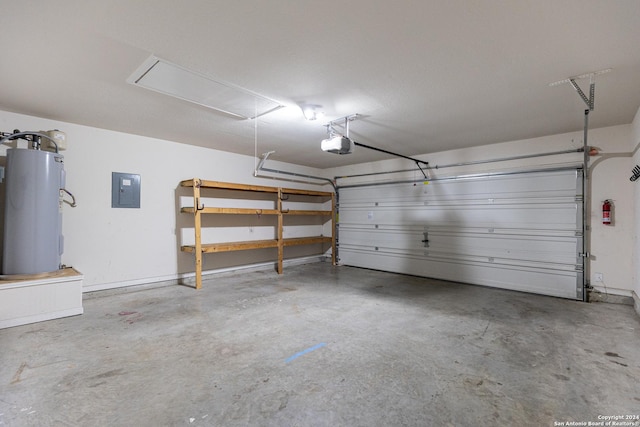 garage featuring a garage door opener, electric water heater, and electric panel