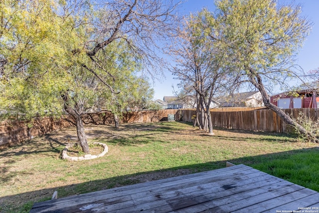 view of yard featuring a deck