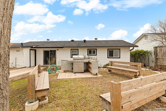 rear view of house featuring a patio area