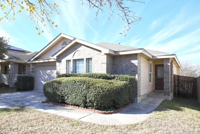 exterior space with a front yard and a garage